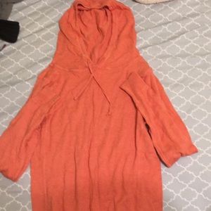 I am selling a orange sweatshirt.